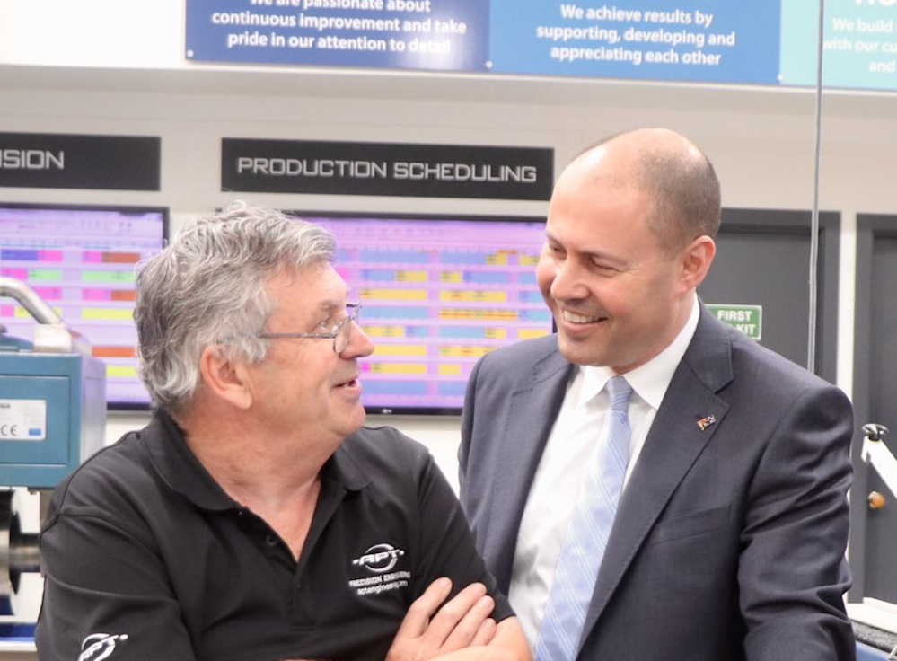 Treasurer Josh Frydenberg, briefing executives from Australian Precision Technologies on the government's SME funding scheme in Berwick yesterday.  (Image: Frydenberg and Twitter)